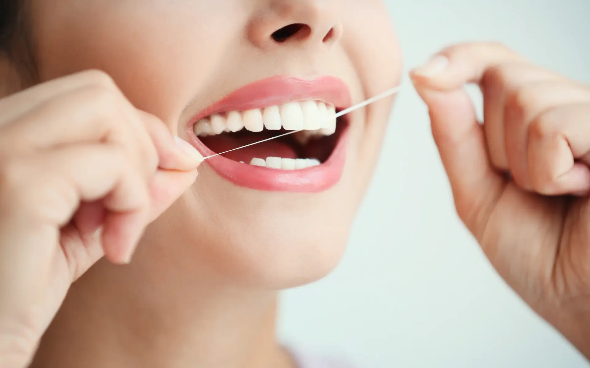 why do my gums bleed when i floss